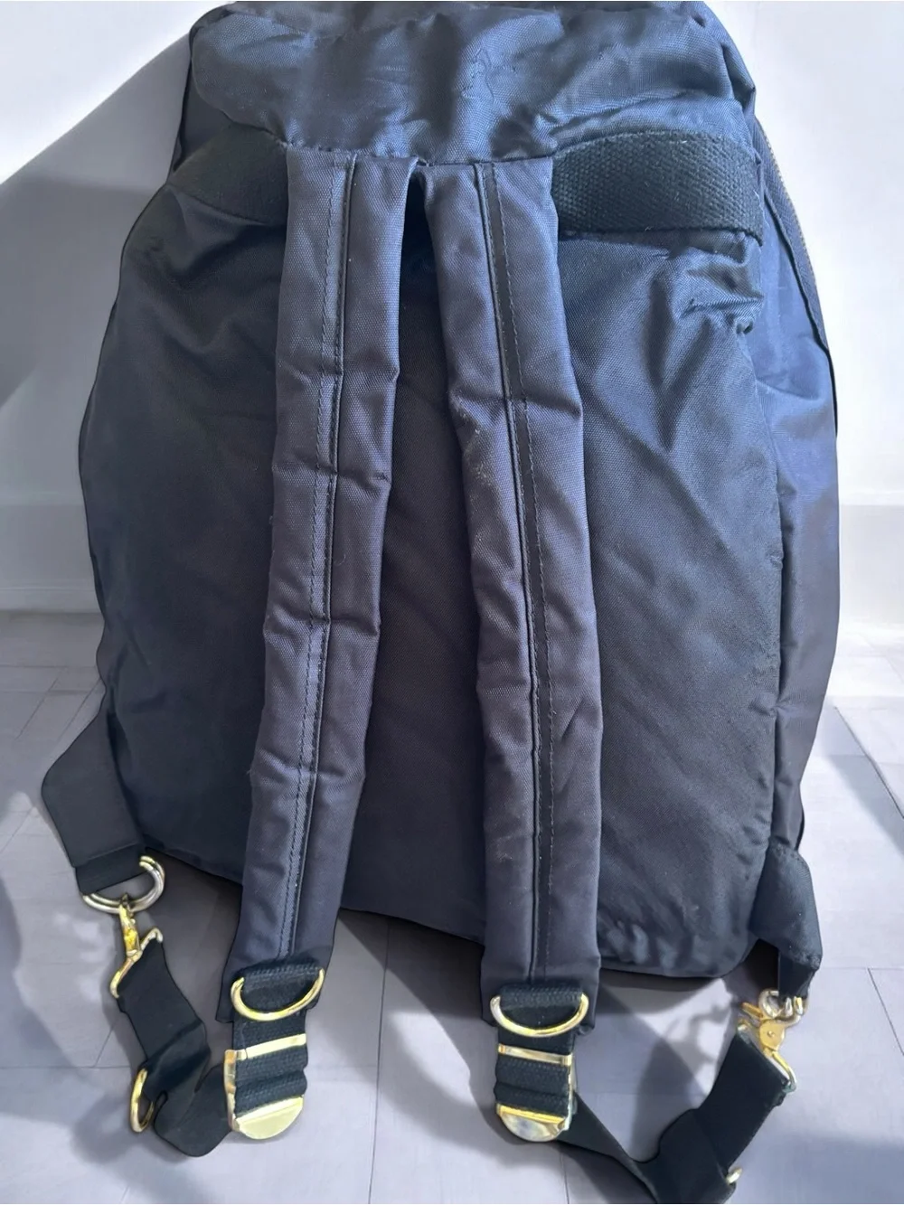Jean Studded Backpack designed with an edgy  streetwear aesthetic.